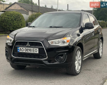 Черный Мицубиси Outlander Sport, объемом двигателя 2 л и пробегом 205 тыс. км за 10750 $, фото 10 на Automoto.ua