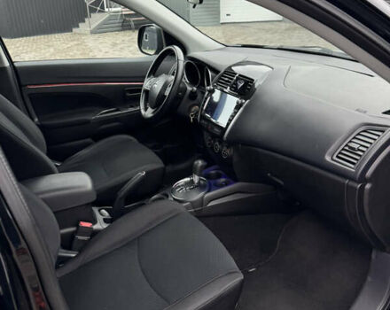 Черный Мицубиси Outlander Sport, объемом двигателя 2 л и пробегом 157 тыс. км за 11900 $, фото 14 на Automoto.ua