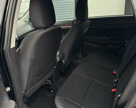 Черный Мицубиси Outlander Sport, объемом двигателя 2 л и пробегом 157 тыс. км за 11900 $, фото 10 на Automoto.ua