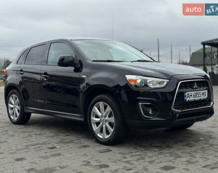 Черный Мицубиси Outlander Sport, объемом двигателя 2 л и пробегом 157 тыс. км за 11900 $, фото 6 на Automoto.ua