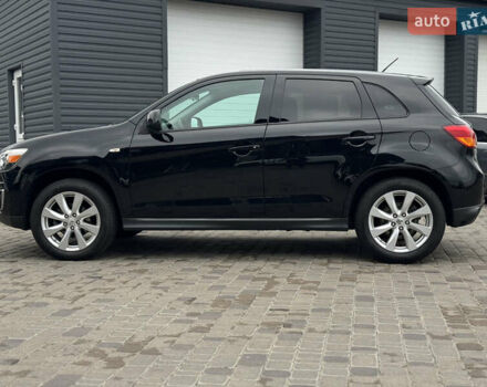 Черный Мицубиси Outlander Sport, объемом двигателя 2 л и пробегом 157 тыс. км за 11900 $, фото 1 на Automoto.ua