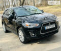 Чорний Міцубісі Outlander Sport, об'ємом двигуна 2 л та пробігом 144 тис. км за 12150 $, фото 4 на Automoto.ua