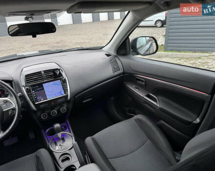 Черный Мицубиси Outlander Sport, объемом двигателя 2 л и пробегом 157 тыс. км за 11900 $, фото 13 на Automoto.ua