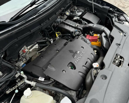 Черный Мицубиси Outlander Sport, объемом двигателя 2 л и пробегом 157 тыс. км за 11900 $, фото 24 на Automoto.ua