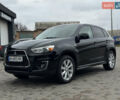 Черный Мицубиси Outlander Sport, объемом двигателя 2 л и пробегом 157 тыс. км за 11900 $, фото 1 на Automoto.ua