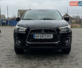 Черный Мицубиси Outlander Sport, объемом двигателя 2 л и пробегом 157 тыс. км за 11900 $, фото 7 на Automoto.ua