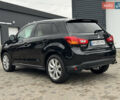 Черный Мицубиси Outlander Sport, объемом двигателя 2 л и пробегом 157 тыс. км за 11900 $, фото 2 на Automoto.ua