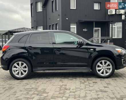 Черный Мицубиси Outlander Sport, объемом двигателя 2 л и пробегом 157 тыс. км за 11900 $, фото 5 на Automoto.ua