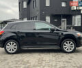 Черный Мицубиси Outlander Sport, объемом двигателя 2 л и пробегом 157 тыс. км за 11900 $, фото 5 на Automoto.ua