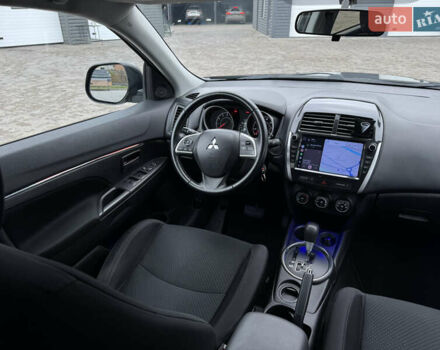 Черный Мицубиси Outlander Sport, объемом двигателя 2 л и пробегом 157 тыс. км за 11900 $, фото 12 на Automoto.ua