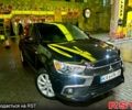 Черный Мицубиси Outlander Sport, объемом двигателя 2.4 л и пробегом 187 тыс. км за 13000 $, фото 2 на Automoto.ua