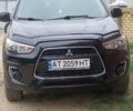 Черный Мицубиси Outlander Sport, объемом двигателя 2 л и пробегом 225 тыс. км за 11200 $, фото 2 на Automoto.ua