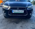 Чорний Міцубісі Outlander Sport, об'ємом двигуна 2.4 л та пробігом 208 тис. км за 12500 $, фото 1 на Automoto.ua