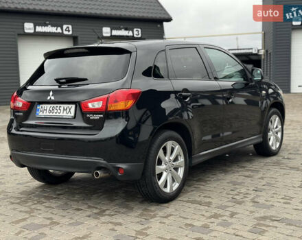 Черный Мицубиси Outlander Sport, объемом двигателя 2 л и пробегом 157 тыс. км за 11900 $, фото 4 на Automoto.ua