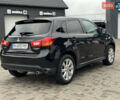 Черный Мицубиси Outlander Sport, объемом двигателя 2 л и пробегом 157 тыс. км за 11900 $, фото 4 на Automoto.ua