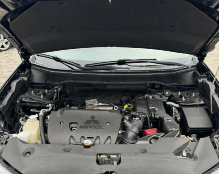 Черный Мицубиси Outlander Sport, объемом двигателя 2 л и пробегом 157 тыс. км за 11900 $, фото 23 на Automoto.ua