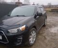 Черный Мицубиси Outlander Sport, объемом двигателя 2 л и пробегом 225 тыс. км за 11200 $, фото 23 на Automoto.ua