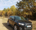 Черный Мицубиси Outlander Sport, объемом двигателя 2.4 л и пробегом 204 тыс. км за 11900 $, фото 1 на Automoto.ua