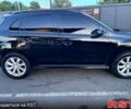 Чорний Міцубісі Outlander Sport, об'ємом двигуна 2.4 л та пробігом 208 тис. км за 12500 $, фото 1 на Automoto.ua