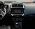 Черный Мицубиси Outlander Sport, объемом двигателя 2.4 л и пробегом 230 тыс. км за 14200 $, фото 39 на Automoto.ua