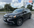 Черный Мицубиси Outlander Sport, объемом двигателя 2 л и пробегом 90 тыс. км за 11900 $, фото 1 на Automoto.ua