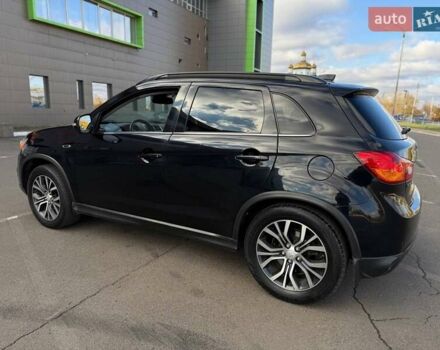 Черный Мицубиси Outlander Sport, объемом двигателя 2.4 л и пробегом 230 тыс. км за 14200 $, фото 26 на Automoto.ua
