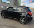 Черный Мицубиси Outlander Sport, объемом двигателя 2.4 л и пробегом 230 тыс. км за 14200 $, фото 26 на Automoto.ua