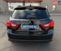 Черный Мицубиси Outlander Sport, объемом двигателя 2.4 л и пробегом 230 тыс. км за 14200 $, фото 24 на Automoto.ua