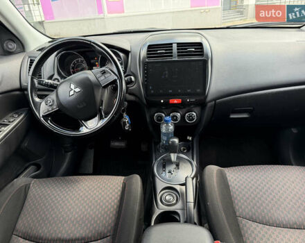 Черный Мицубиси Outlander Sport, объемом двигателя 2 л и пробегом 90 тыс. км за 11900 $, фото 15 на Automoto.ua