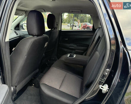 Черный Мицубиси Outlander Sport, объемом двигателя 2 л и пробегом 90 тыс. км за 11900 $, фото 19 на Automoto.ua