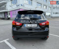 Черный Мицубиси Outlander Sport, объемом двигателя 2 л и пробегом 90 тыс. км за 11900 $, фото 6 на Automoto.ua