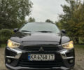 Черный Мицубиси Outlander Sport, объемом двигателя 2.4 л и пробегом 140 тыс. км за 11000 $, фото 2 на Automoto.ua