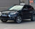 Черный Мицубиси Outlander Sport, объемом двигателя 2.4 л и пробегом 230 тыс. км за 14200 $, фото 1 на Automoto.ua