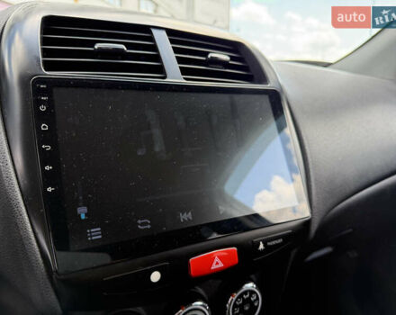 Черный Мицубиси Outlander Sport, объемом двигателя 2 л и пробегом 90 тыс. км за 11900 $, фото 17 на Automoto.ua