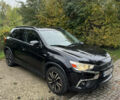 Черный Мицубиси Outlander Sport, объемом двигателя 2.4 л и пробегом 140 тыс. км за 11000 $, фото 1 на Automoto.ua
