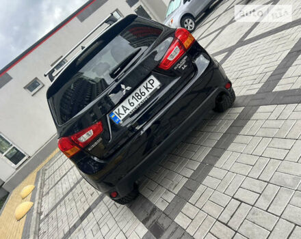 Черный Мицубиси Outlander Sport, объемом двигателя 2.4 л и пробегом 107 тыс. км за 11650 $, фото 10 на Automoto.ua