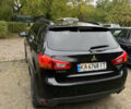 Черный Мицубиси Outlander Sport, объемом двигателя 2.4 л и пробегом 140 тыс. км за 11000 $, фото 5 на Automoto.ua