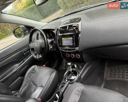 Черный Мицубиси Outlander Sport, объемом двигателя 2.4 л и пробегом 140 тыс. км за 11000 $, фото 10 на Automoto.ua
