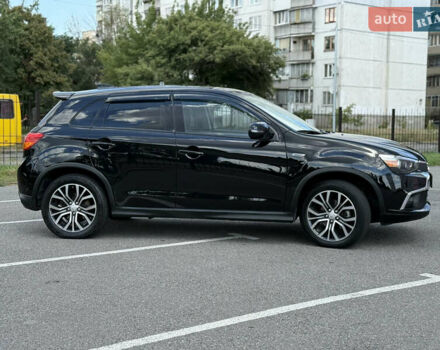 Черный Мицубиси Outlander Sport, объемом двигателя 2 л и пробегом 90 тыс. км за 11900 $, фото 4 на Automoto.ua