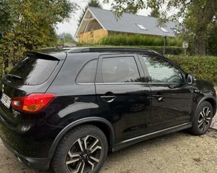 Черный Мицубиси Outlander Sport, объемом двигателя 2.4 л и пробегом 140 тыс. км за 11000 $, фото 3 на Automoto.ua