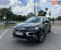 Черный Мицубиси Outlander Sport, объемом двигателя 2 л и пробегом 90 тыс. км за 11900 $, фото 1 на Automoto.ua