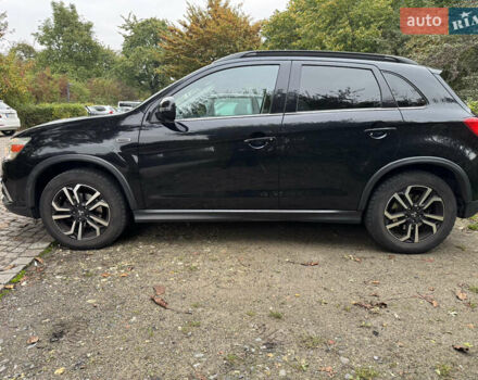 Черный Мицубиси Outlander Sport, объемом двигателя 2.4 л и пробегом 140 тыс. км за 11000 $, фото 6 на Automoto.ua
