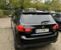 Черный Мицубиси Outlander Sport, объемом двигателя 2.4 л и пробегом 140 тыс. км за 11000 $, фото 4 на Automoto.ua