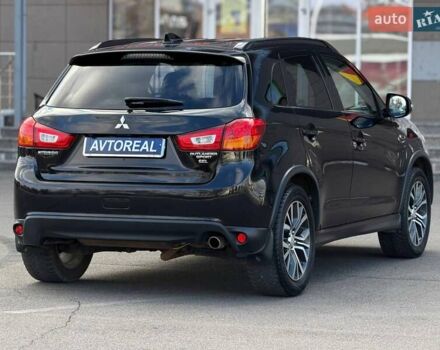 Черный Мицубиси Outlander Sport, объемом двигателя 2.4 л и пробегом 230 тыс. км за 14200 $, фото 16 на Automoto.ua
