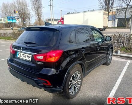 Черный Мицубиси Outlander Sport, объемом двигателя 2 л и пробегом 71 тыс. км за 15000 $, фото 3 на Automoto.ua