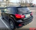 Черный Мицубиси Outlander Sport, объемом двигателя 2 л и пробегом 71 тыс. км за 15000 $, фото 2 на Automoto.ua