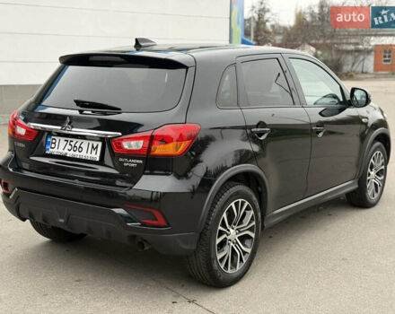 Черный Мицубиси Outlander Sport, объемом двигателя 2 л и пробегом 101 тыс. км за 14300 $, фото 3 на Automoto.ua