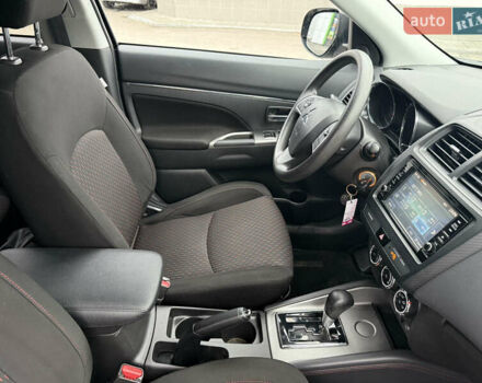 Черный Мицубиси Outlander Sport, объемом двигателя 2 л и пробегом 101 тыс. км за 14300 $, фото 13 на Automoto.ua