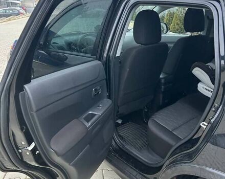 Черный Мицубиси Outlander Sport, объемом двигателя 2 л и пробегом 147 тыс. км за 19200 $, фото 14 на Automoto.ua