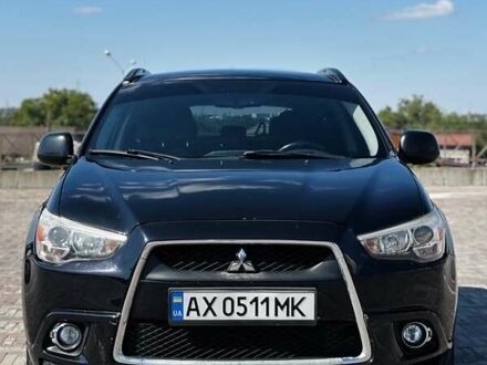 Черный Мицубиси Outlander Sport, объемом двигателя 2 л и пробегом 289 тыс. км за 10300 $, фото 1 на Automoto.ua